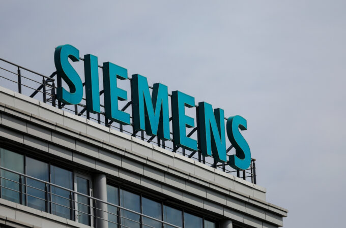 A sign with the logo of Siemens company is on display outside its office in Moscow